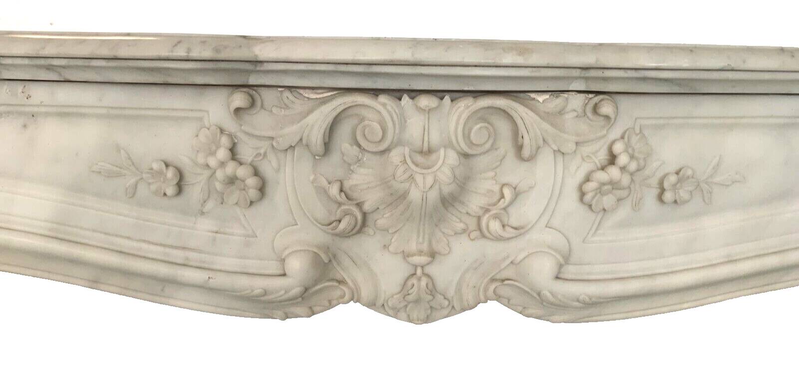 Louis XV style fireplace in white Carrara marble 19th century