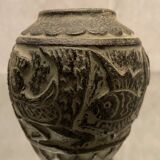 Terracotta vase with green digging patina with animal decoration