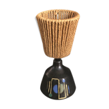 Brutalist style laying lamp with rope lampshade and ceramic foot