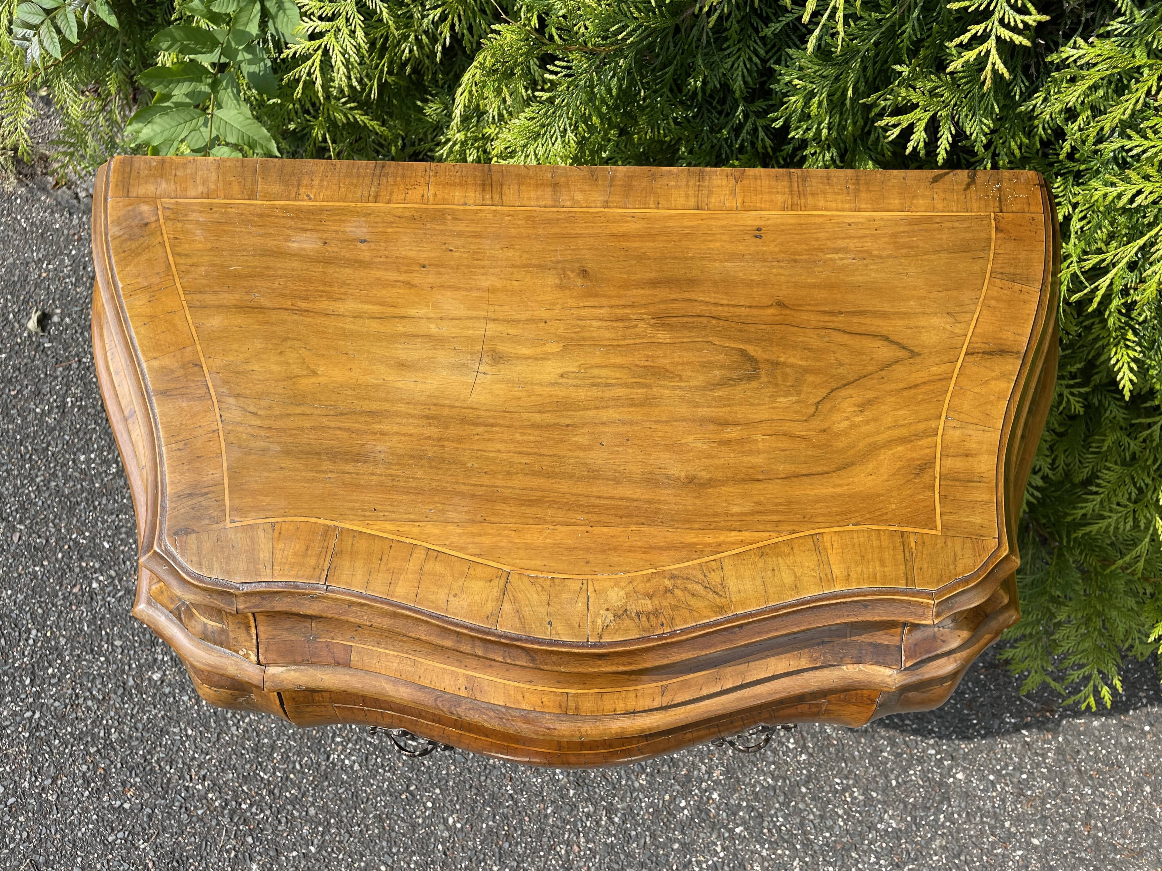 Chest of drawers in Dutch style marquetry with secret drawer.