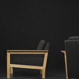 2 vintage oak and felt Danish chaise longues from the mid-century, 1960s.