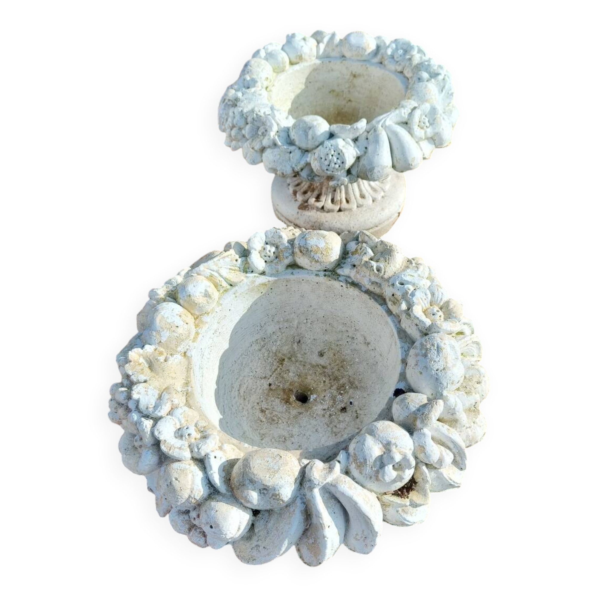 Pair of round stone fruit bowls on foot