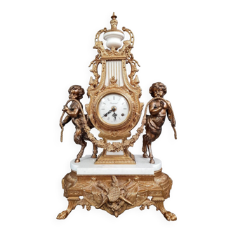 Imperial clock in the shape of a lyre supported by 2 cherubs in bronze and marble circa 1950-1960