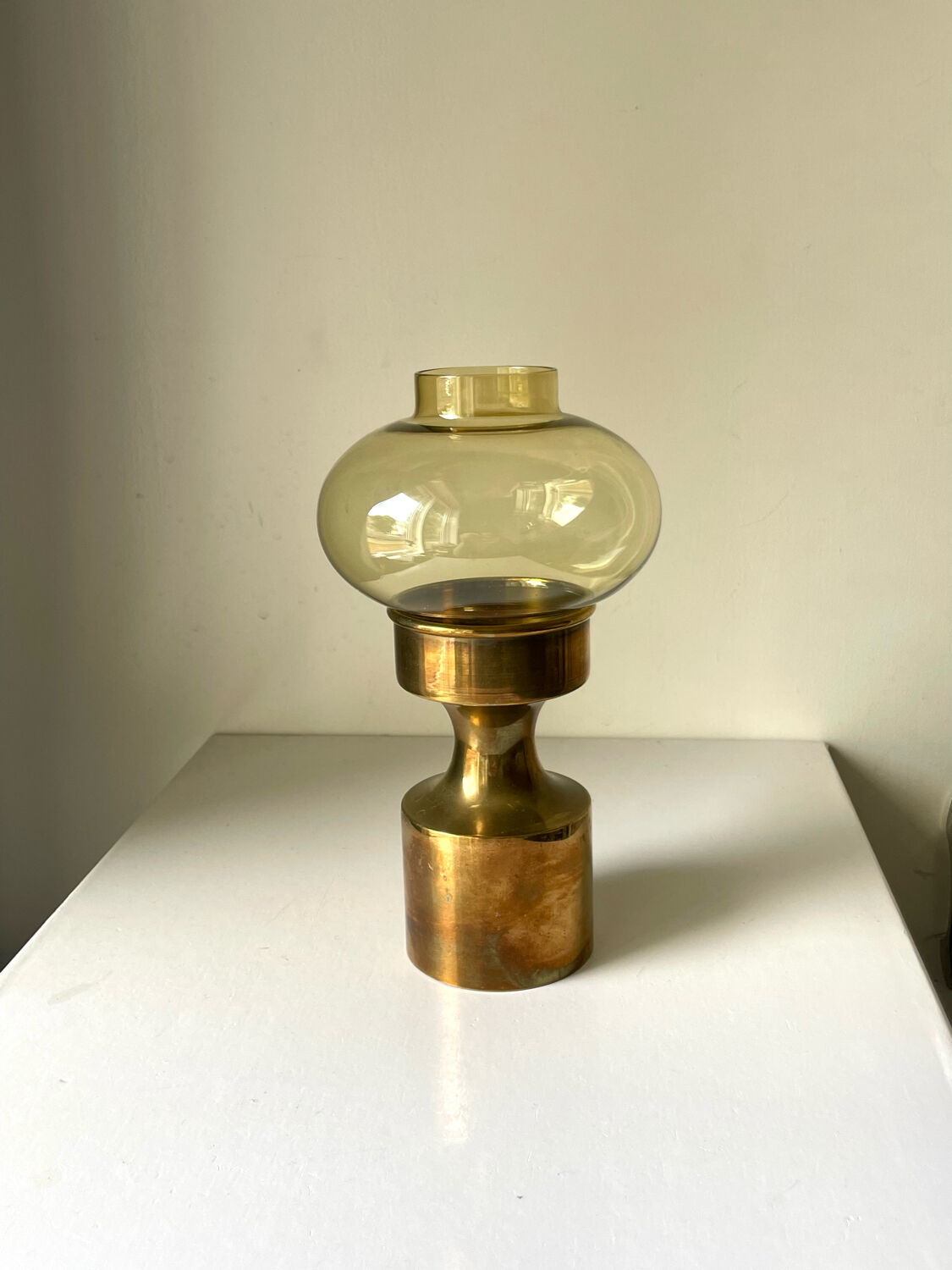 Danish design 1960 hurricane candleholder in brass and amber colored glass