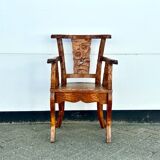 Fauteuil en teck poignardé à la main