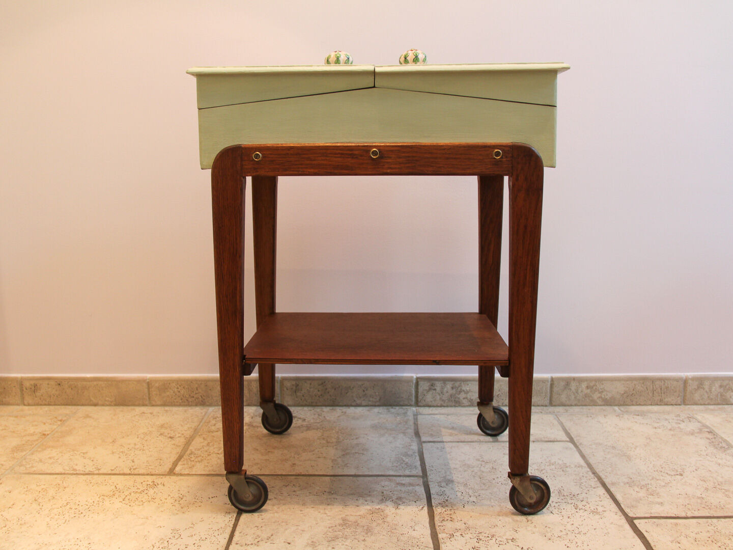 Worker green wood feet wheels