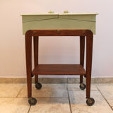 Worker green wood feet wheels