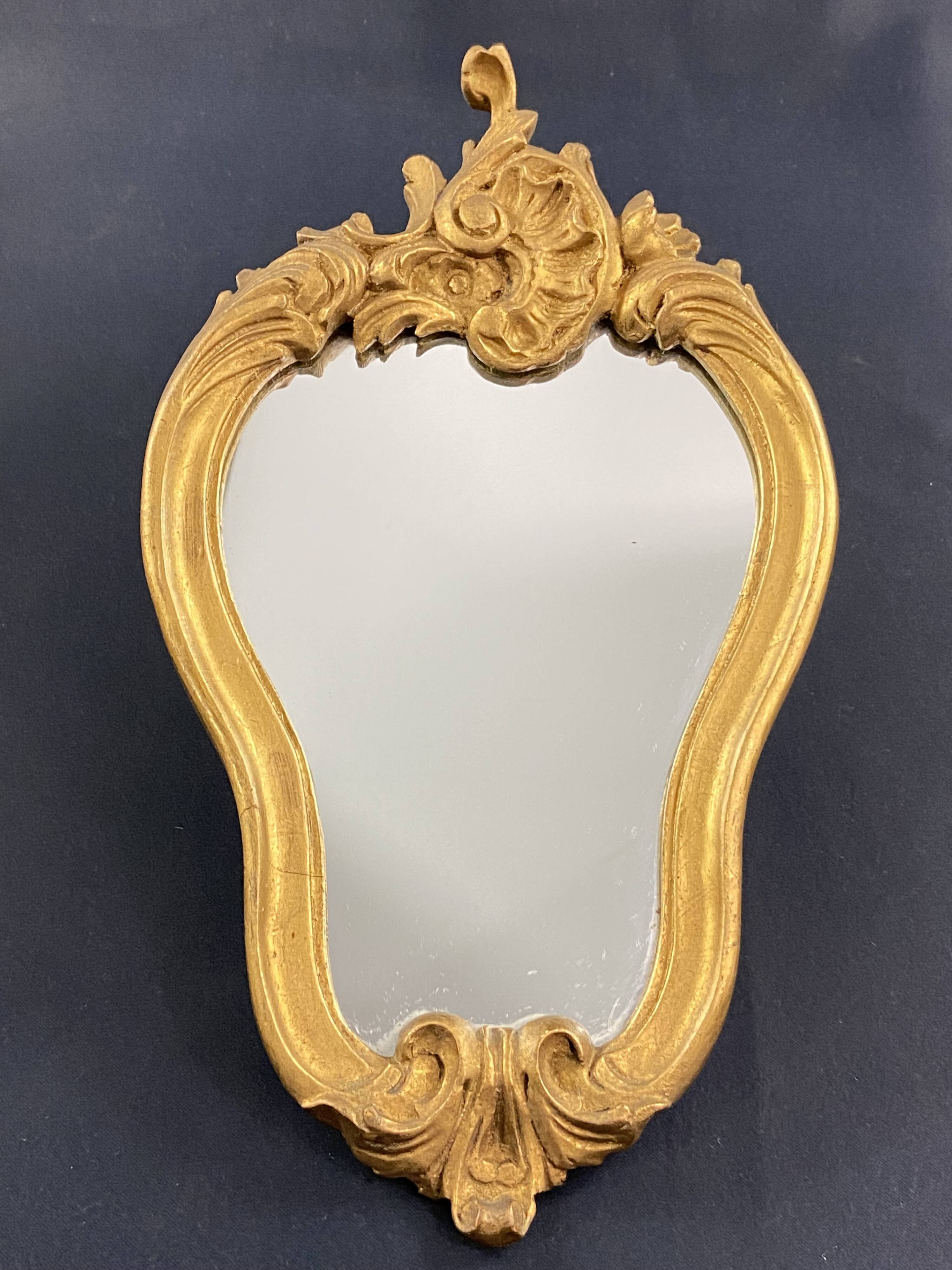 Violin mirror with shell decoration