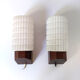 Opaline and teak sconces