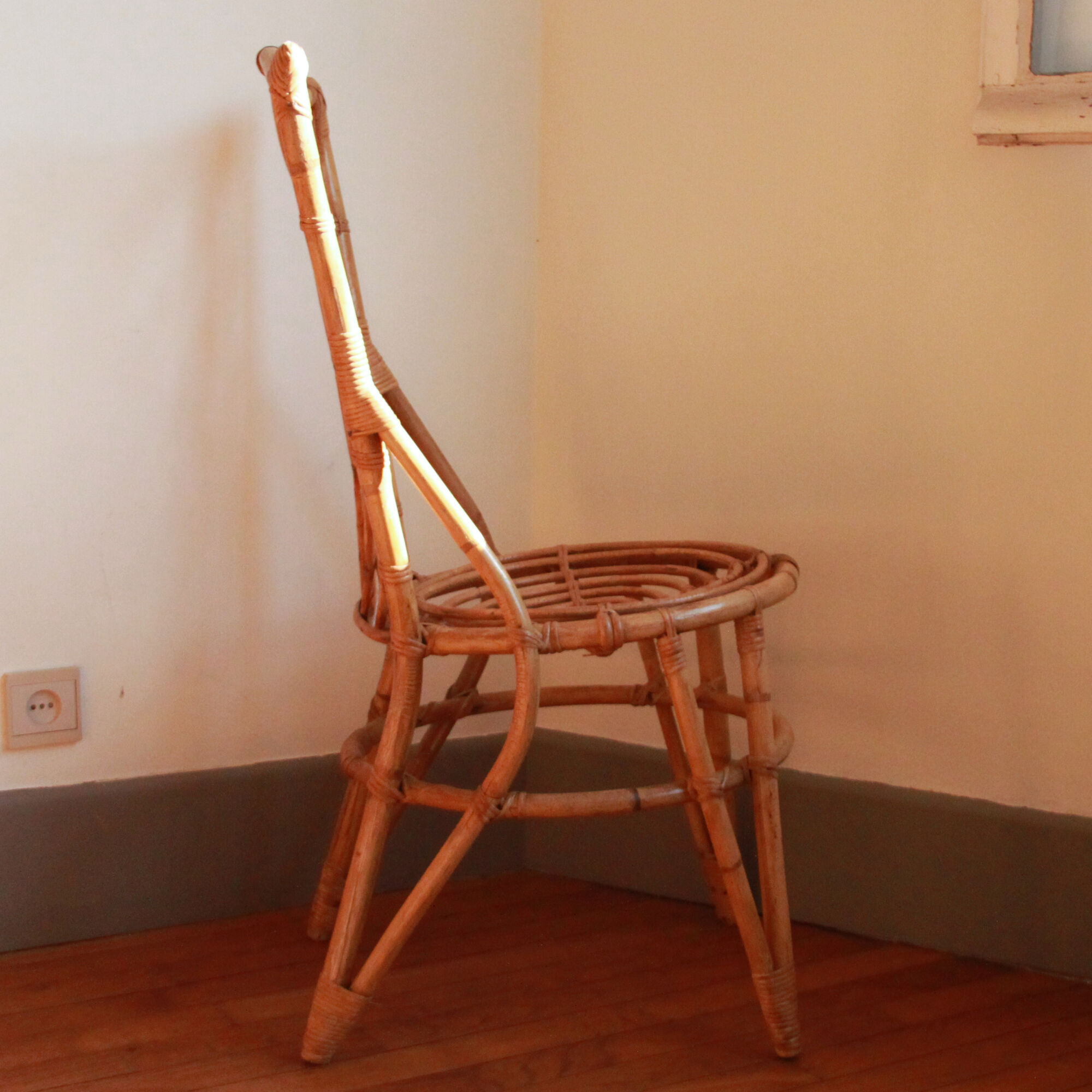 Trio of chairs in rattan Louis Sognot 50 60