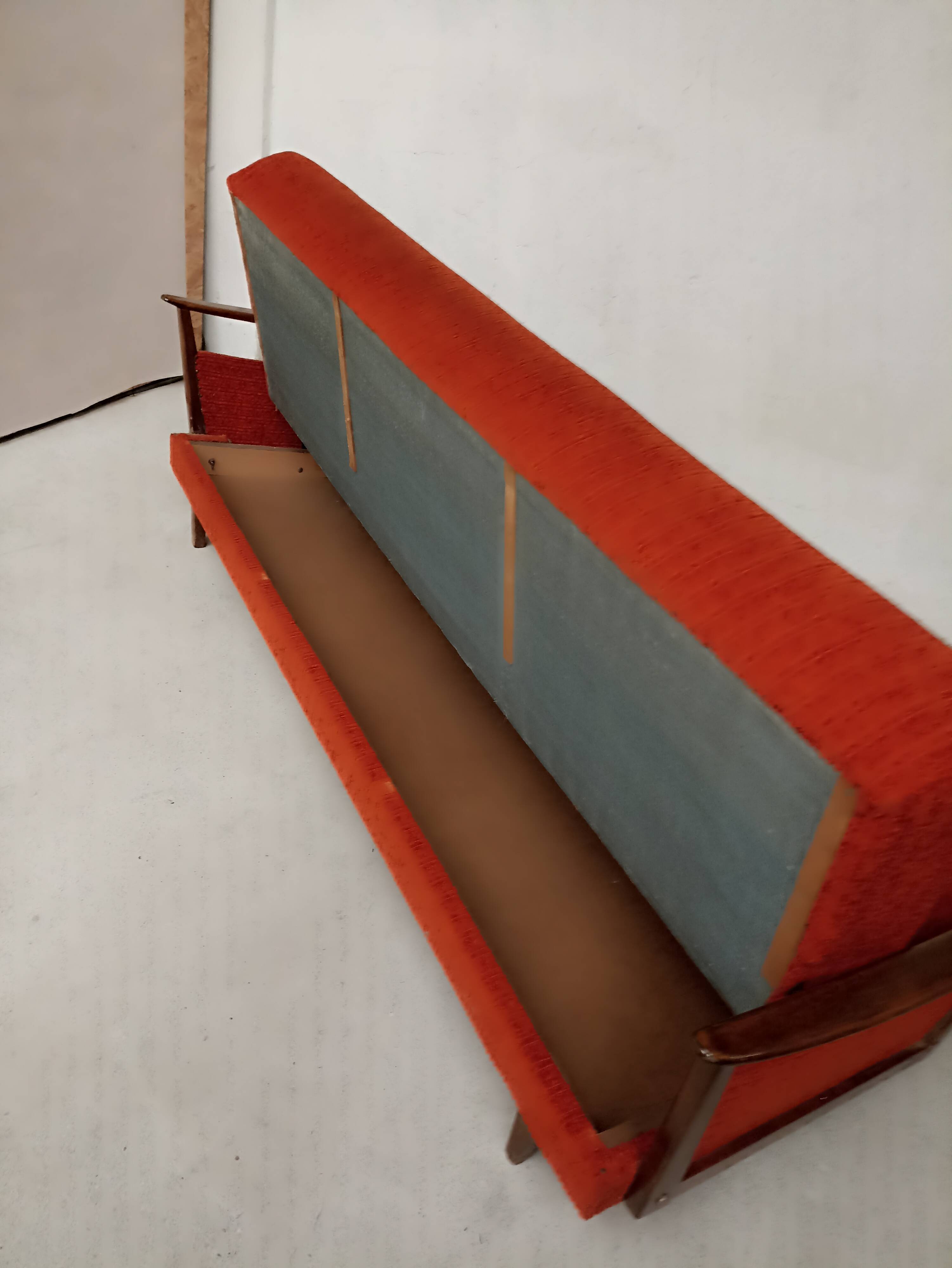 Vintage orange convertible sofa