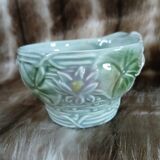 Antique cup and saucer in majolica.