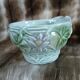 Antique cup and saucer in majolica.