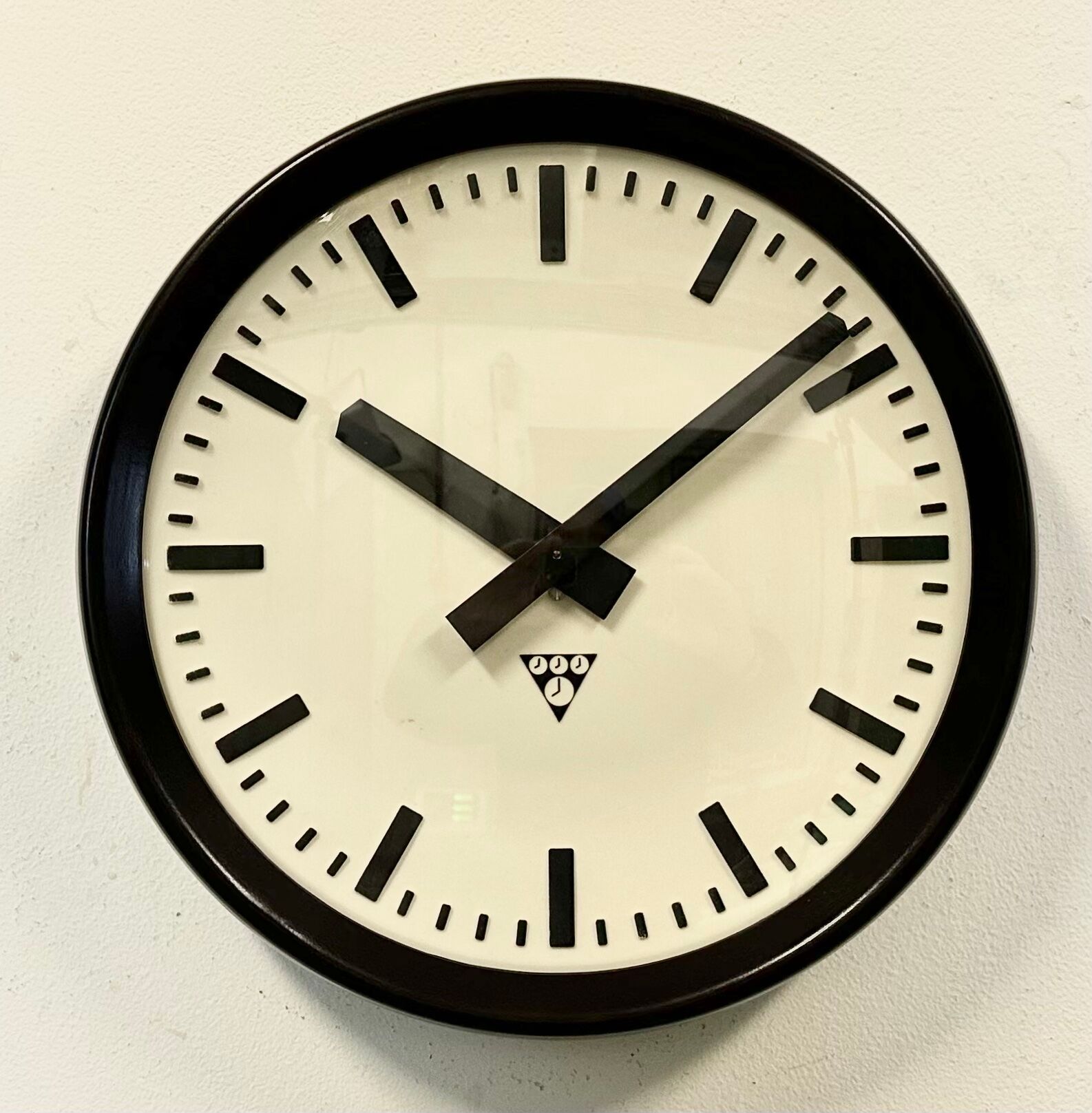 Industrial bakelite factory wall clock from Pragotron, 1960s