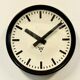 Industrial bakelite factory wall clock from Pragotron, 1960s