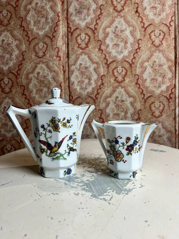 Limoges porcelain teapot/coffee pot and milk jug decorated with peacocks