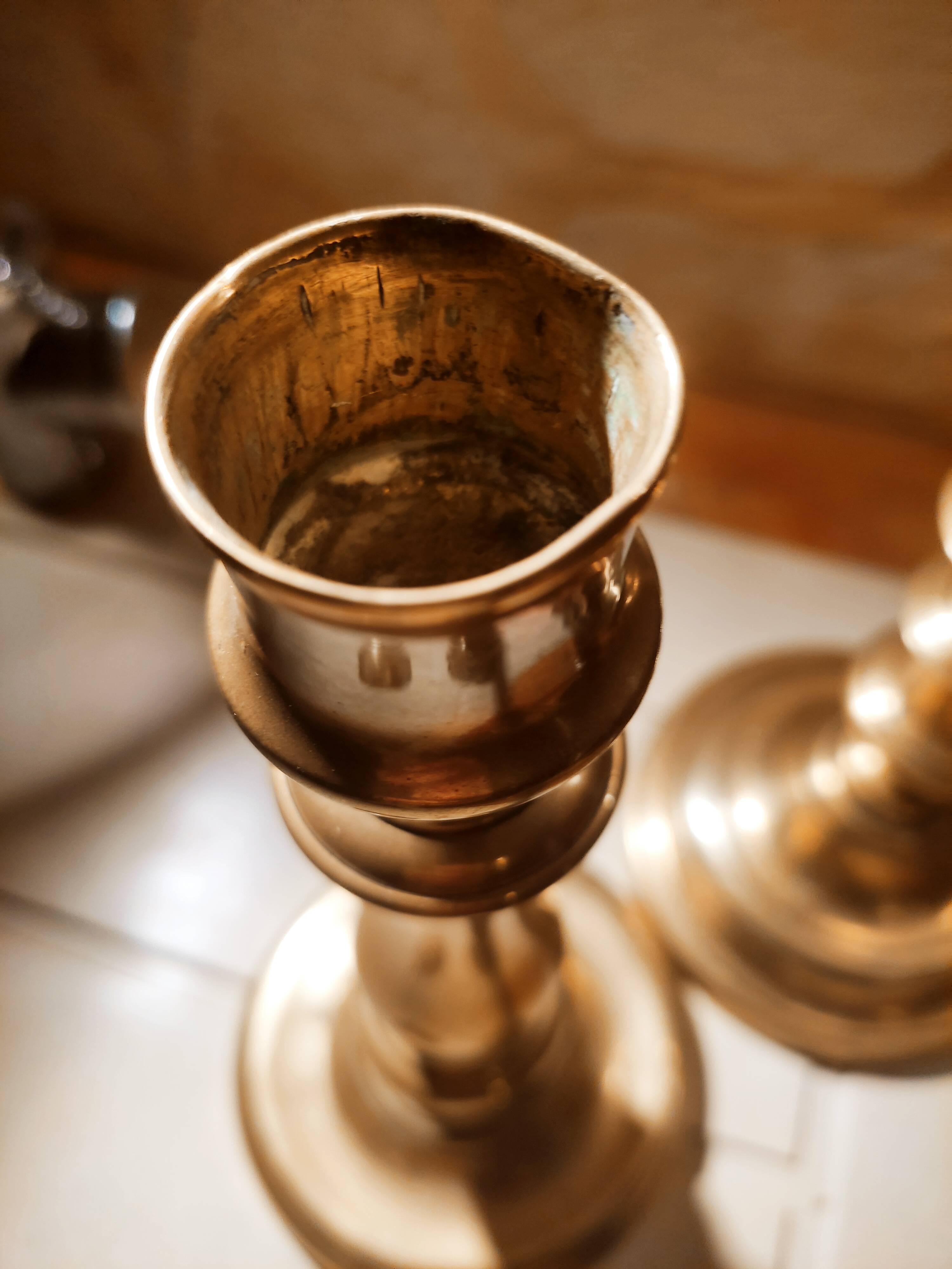 Pair of brass candle holders