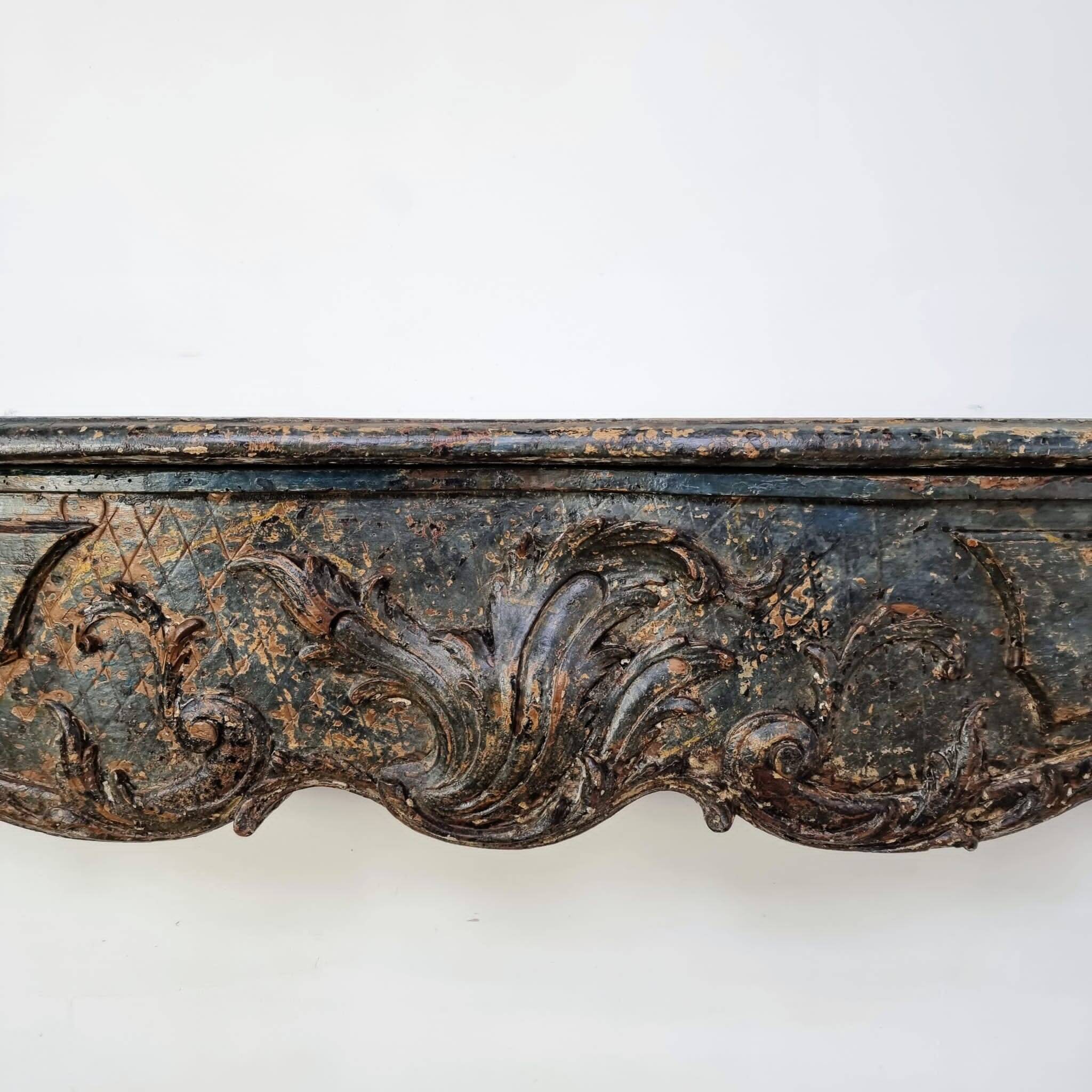 18th century carved wooden fireplace