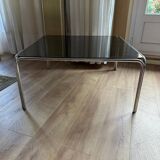Vintage coffee table in chromed metal and smoked glass