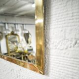 Brass half-moon mirror