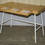 Small bamboo desk with three drawers.