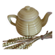 Old yellow earthenware teapot