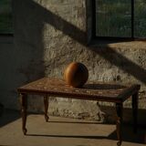 Vintage Indian teak coffee table inlaid with elephant motifs, mid-20th century.