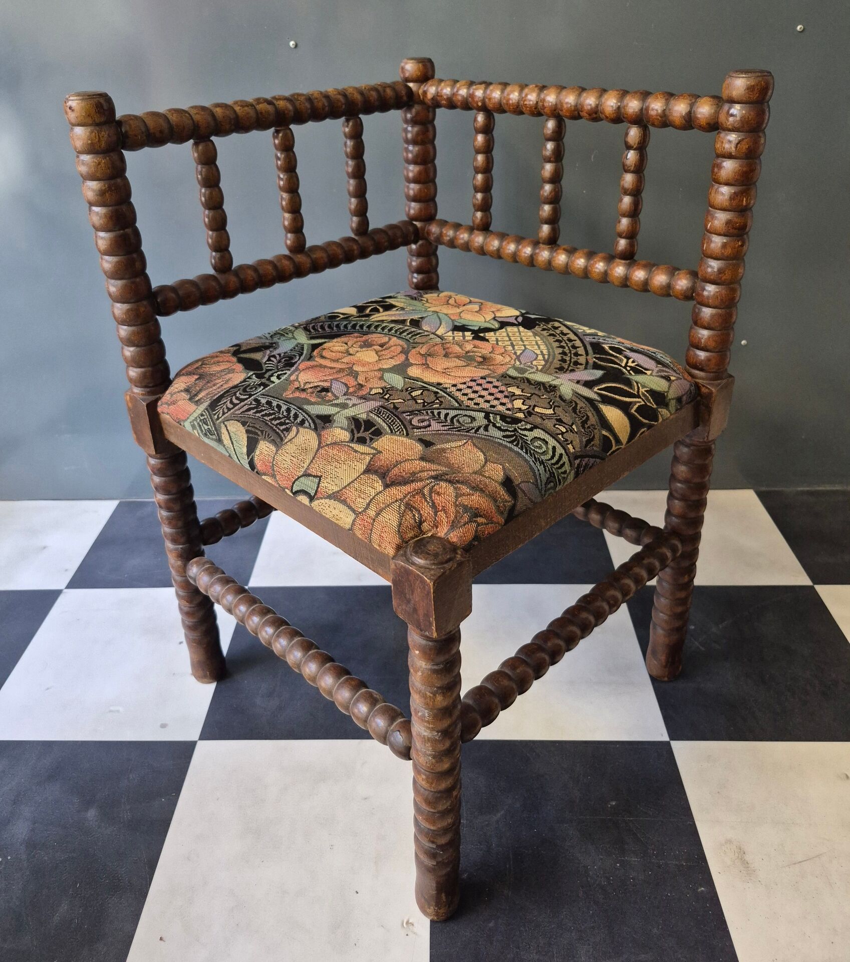 Old pair of corner chairs known as 'fireplace corner' armchairs.
