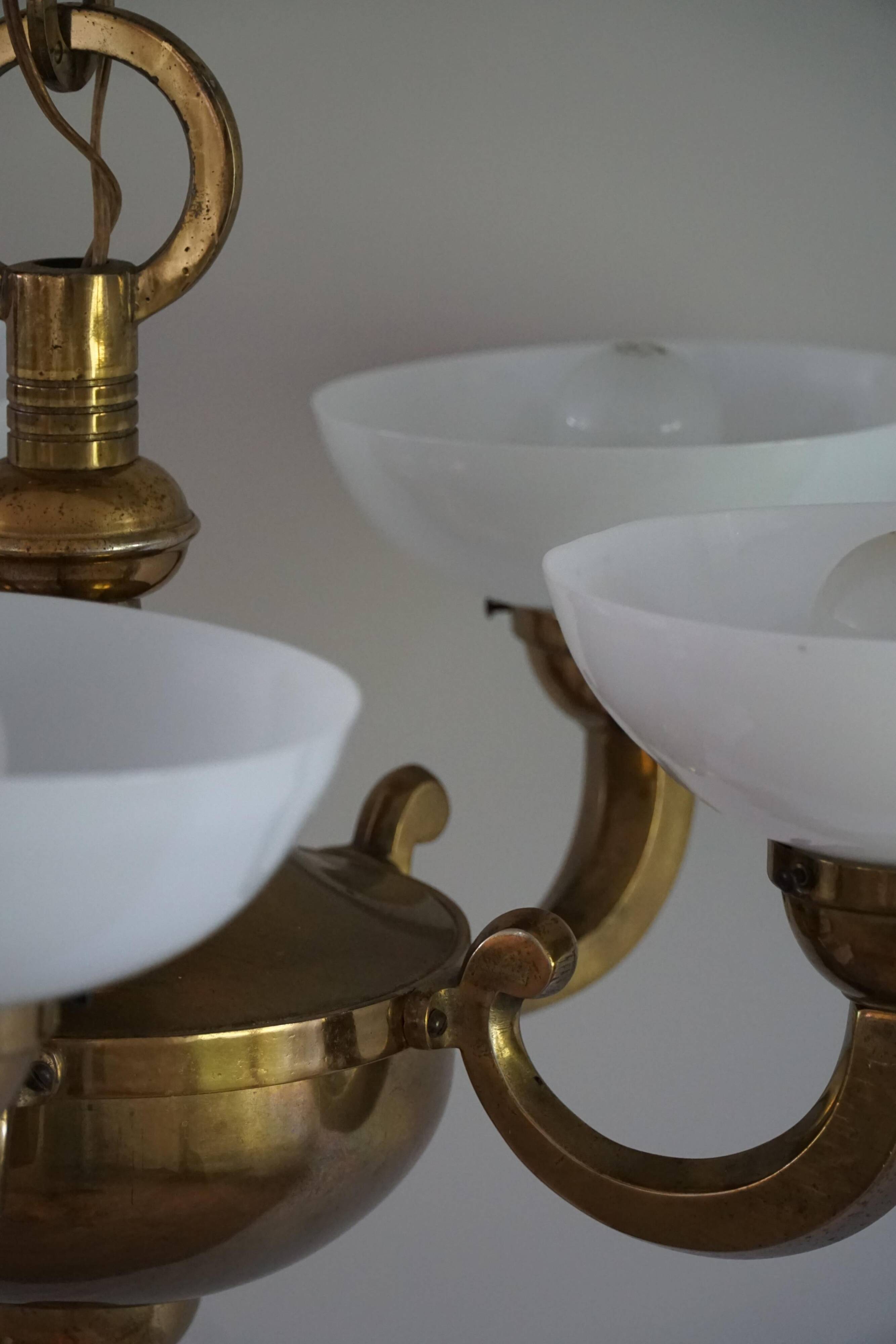 A modern Danish Art Deco chandelier, glass and brass, 1940s.