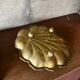 Empty pocket scallop in brass from the 50s