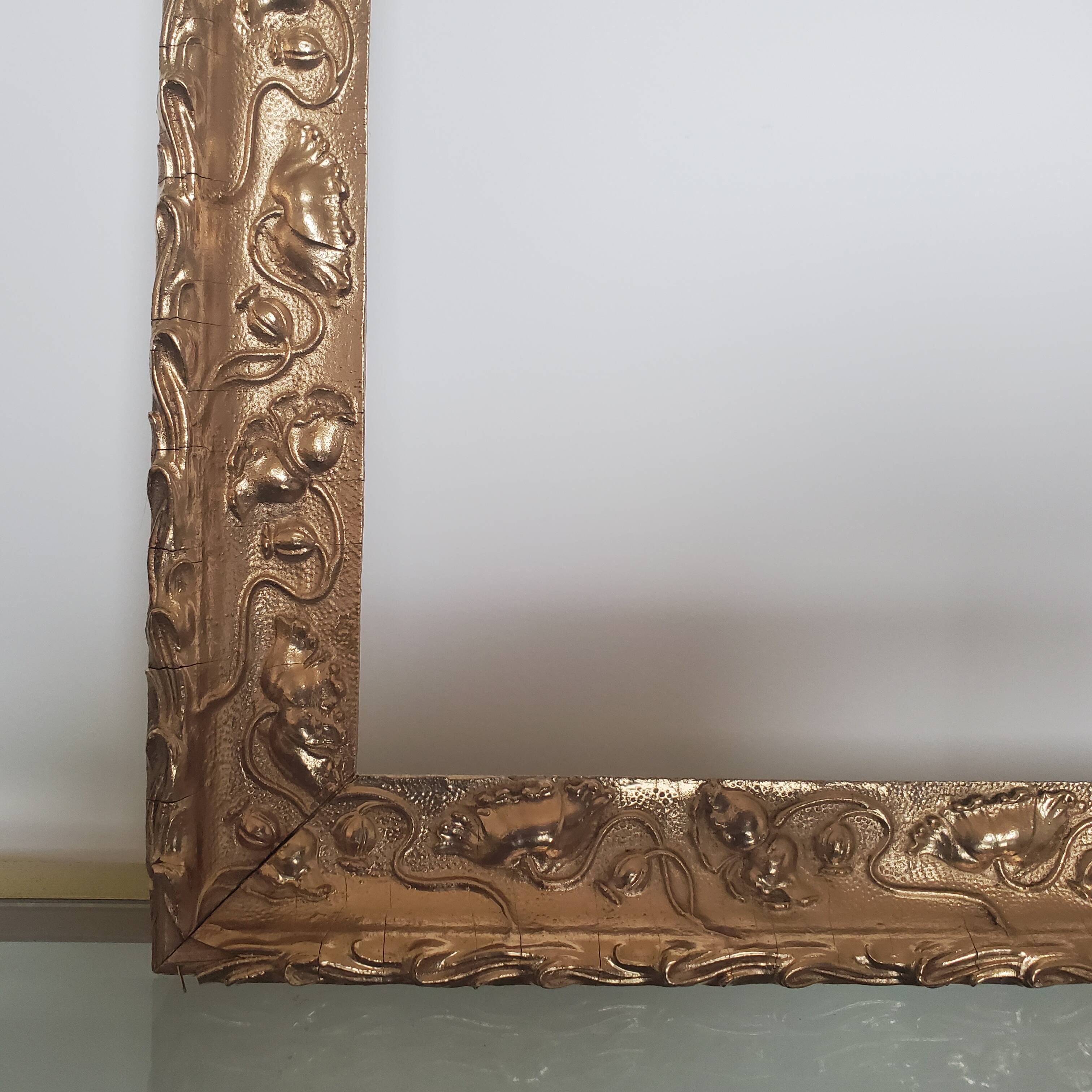 Large old gilded wooden frame