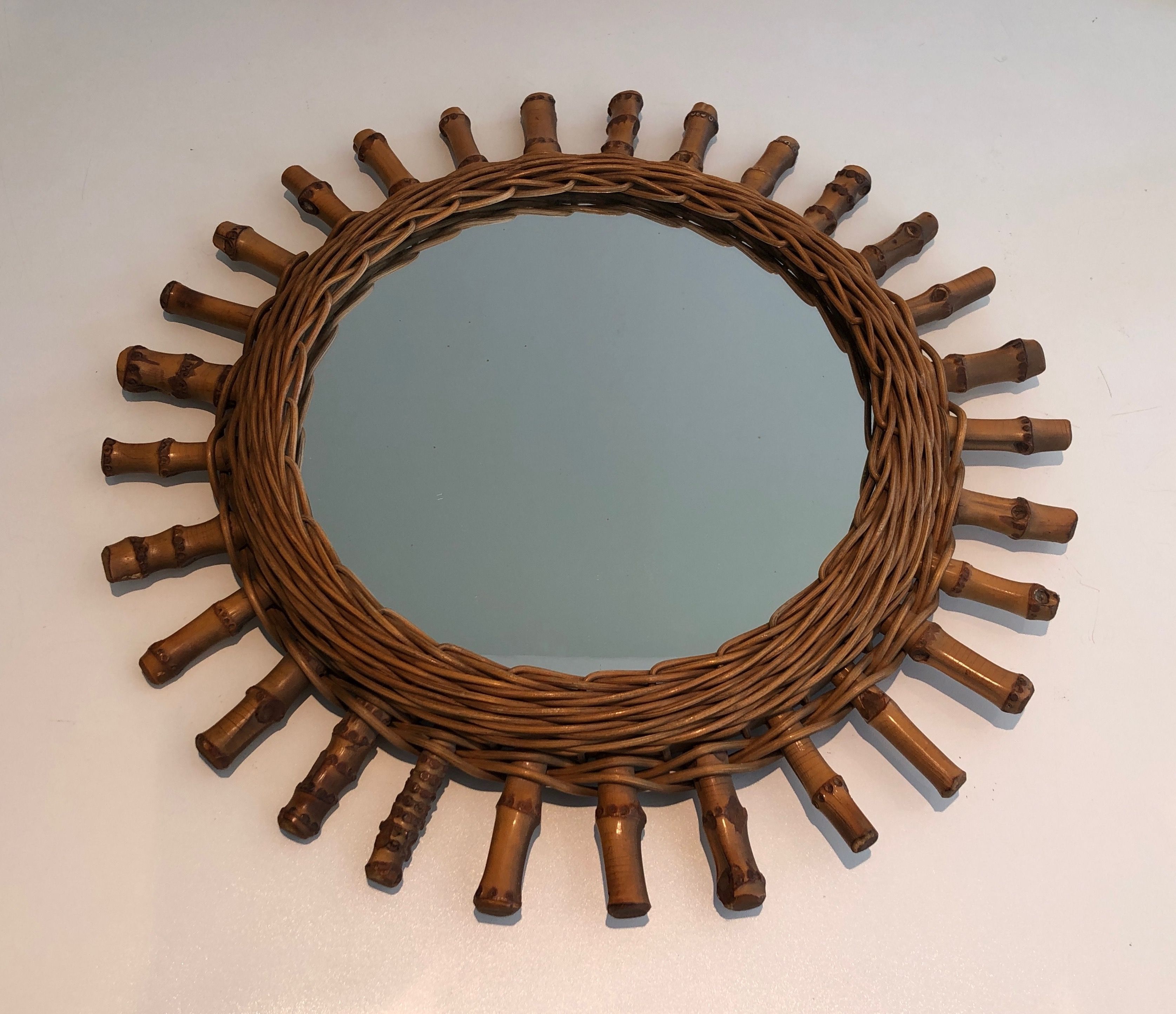 Round rattan mirror