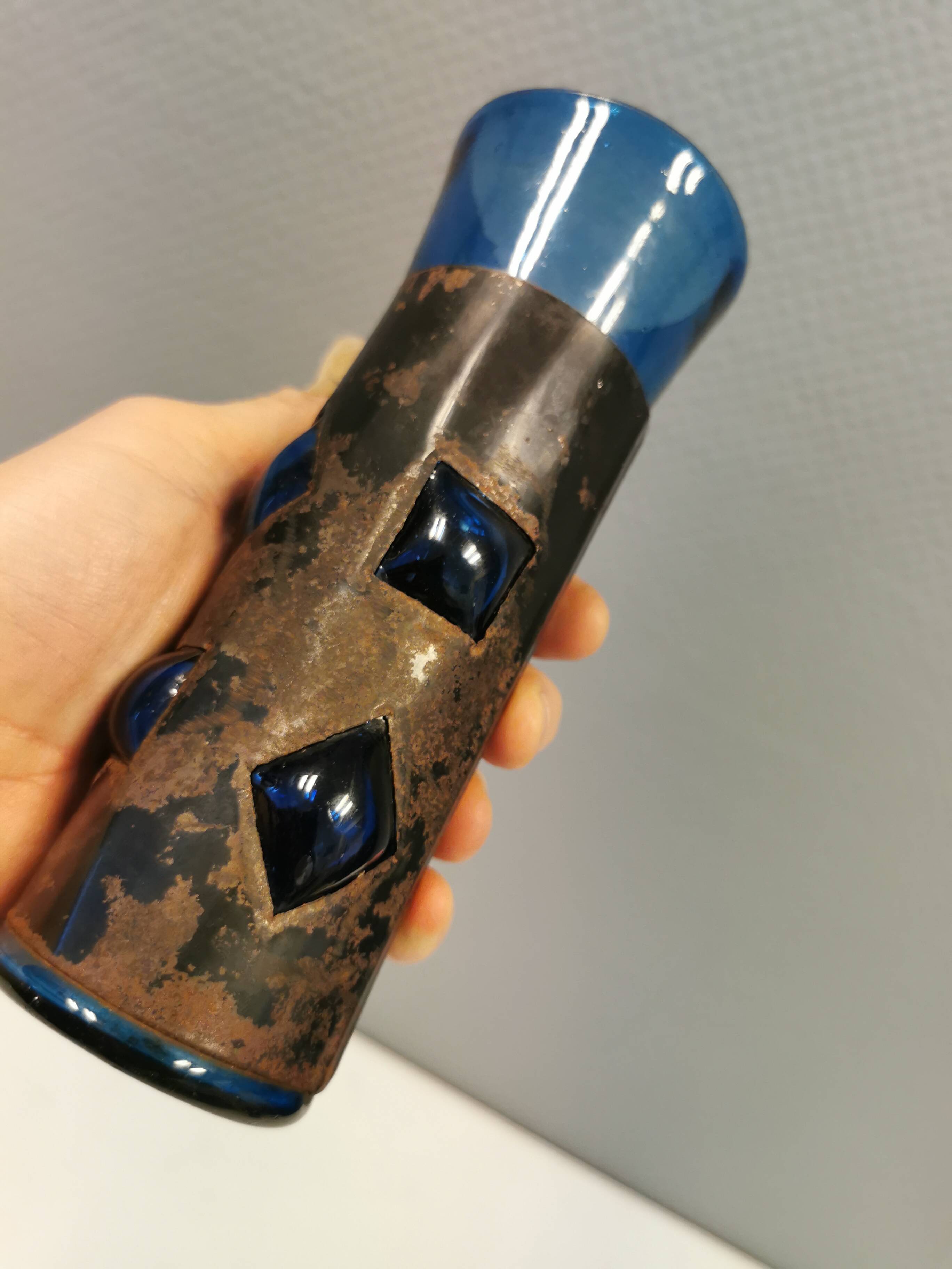 Brutalist style vase with inner blue glass mouth-blown out through the metal "frame".