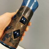 Brutalist style vase with inner blue glass mouth-blown out through the metal "frame".