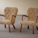 Pair of clam chairs in lambswool, Skive Møbelfabrik, Denmark, 1950s