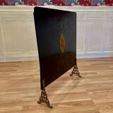 Metal fireplace screen from the period.