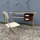 Small vintage desk with formica drawers and 70s chair