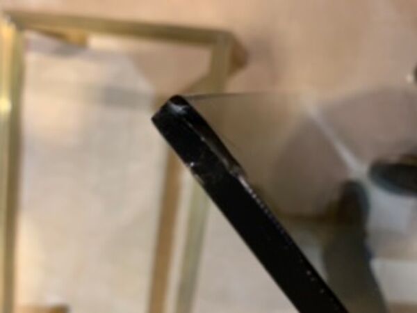 Table basse laiton et verre fumé