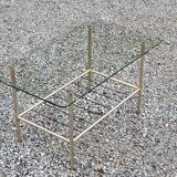 Vintage coffee table in gold and blackened metal with glass top from the 60s