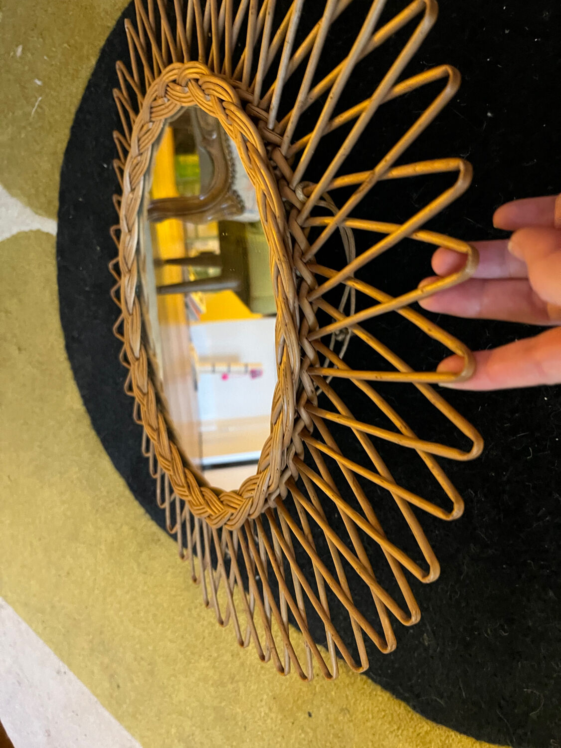 Round wicker mirror from the 1960s.