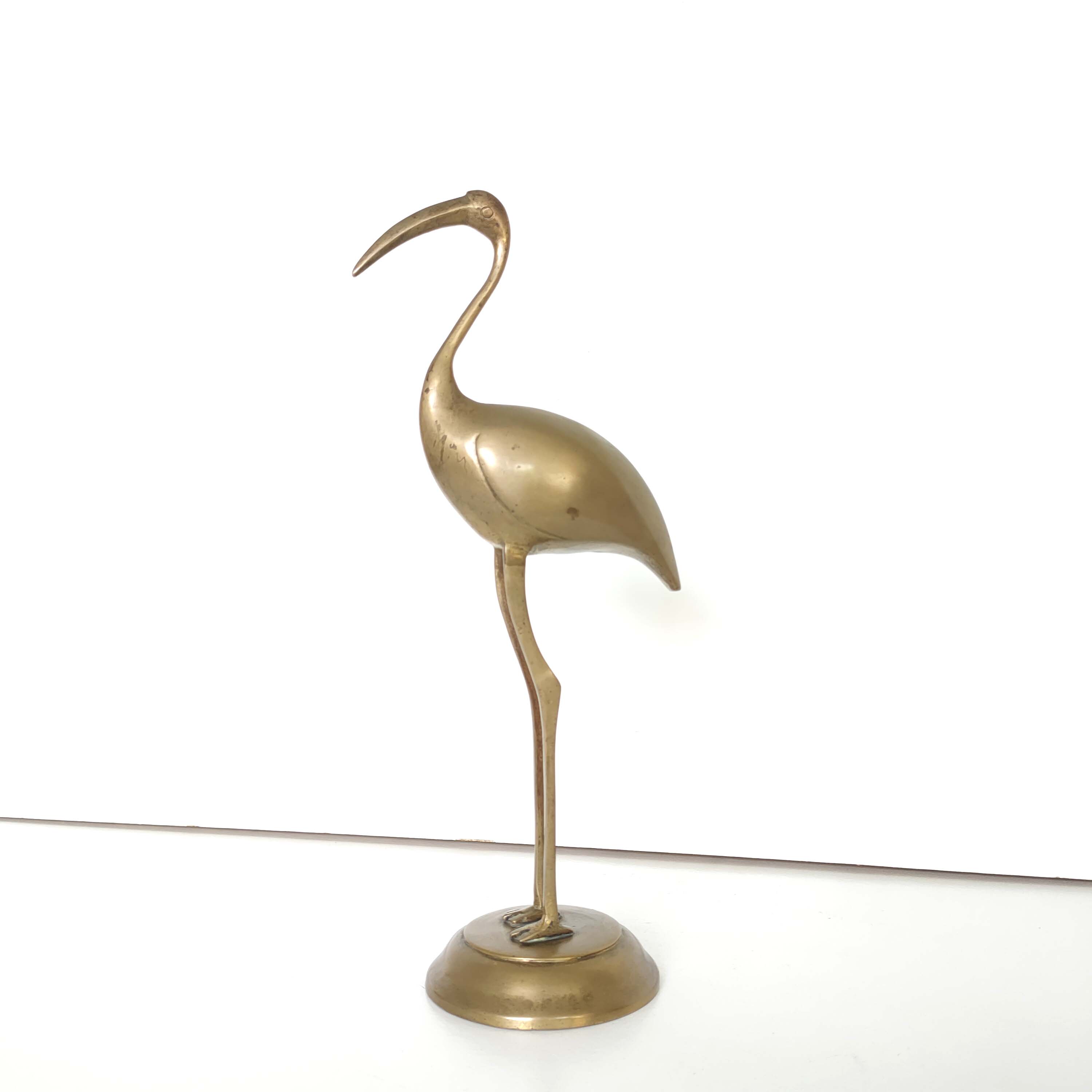 Brass heron