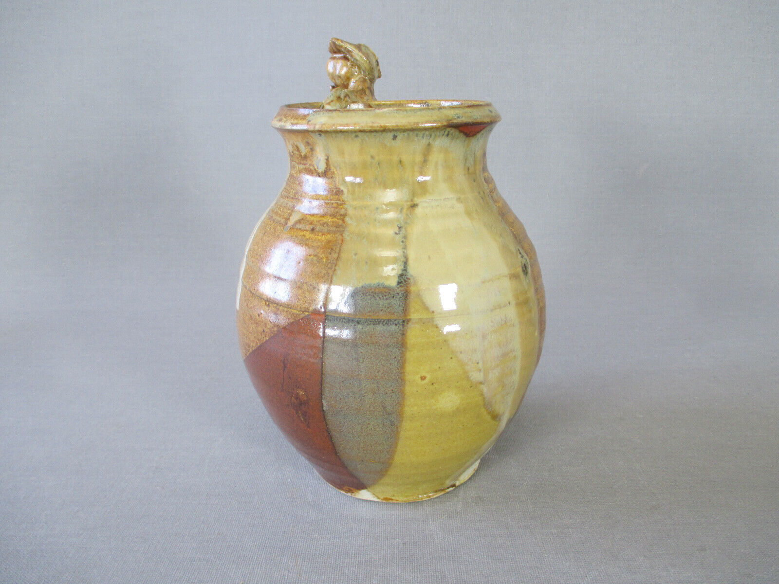 Signed anthropomorphic sandstone vase to be identified