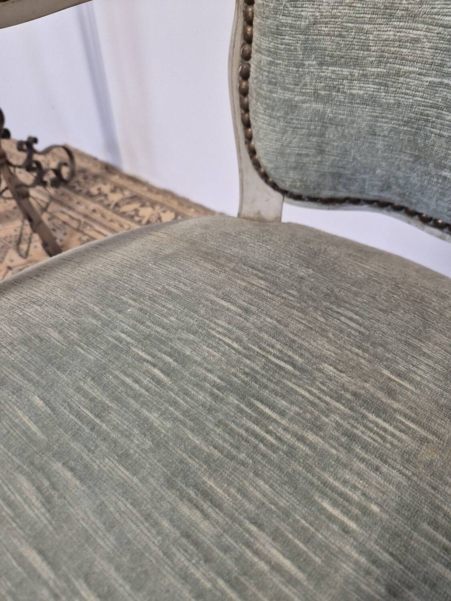 Louis XV style cabriolet armchair in patinated wood and velvet