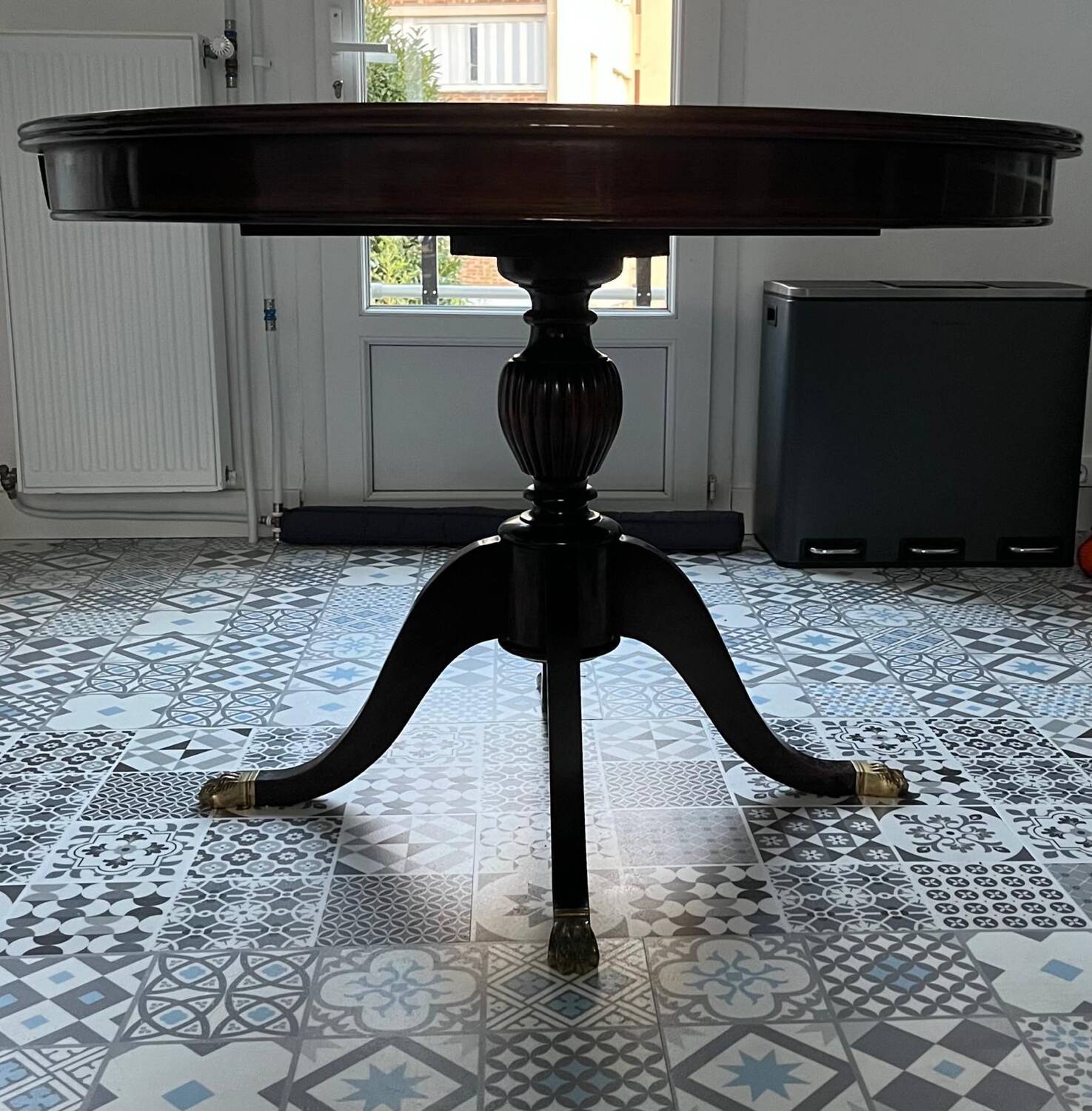 Empire-style table in solid walnut.