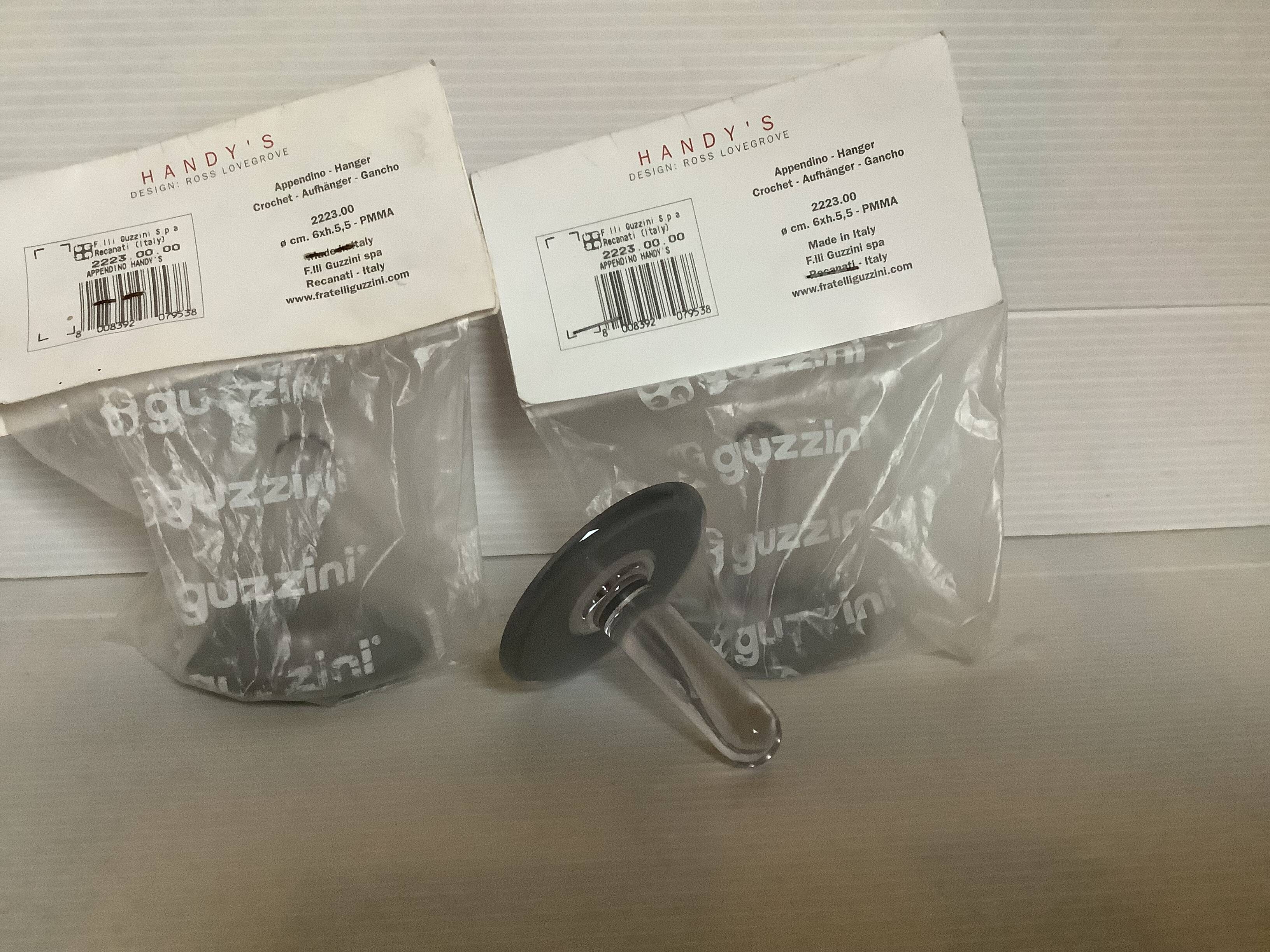 Trio of guzzini coat hooks design Ross Lovegrove plexiglass