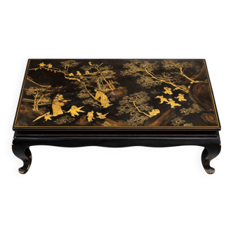 Antique lacquered wooden coffee table with hand-painted Chinese decor.