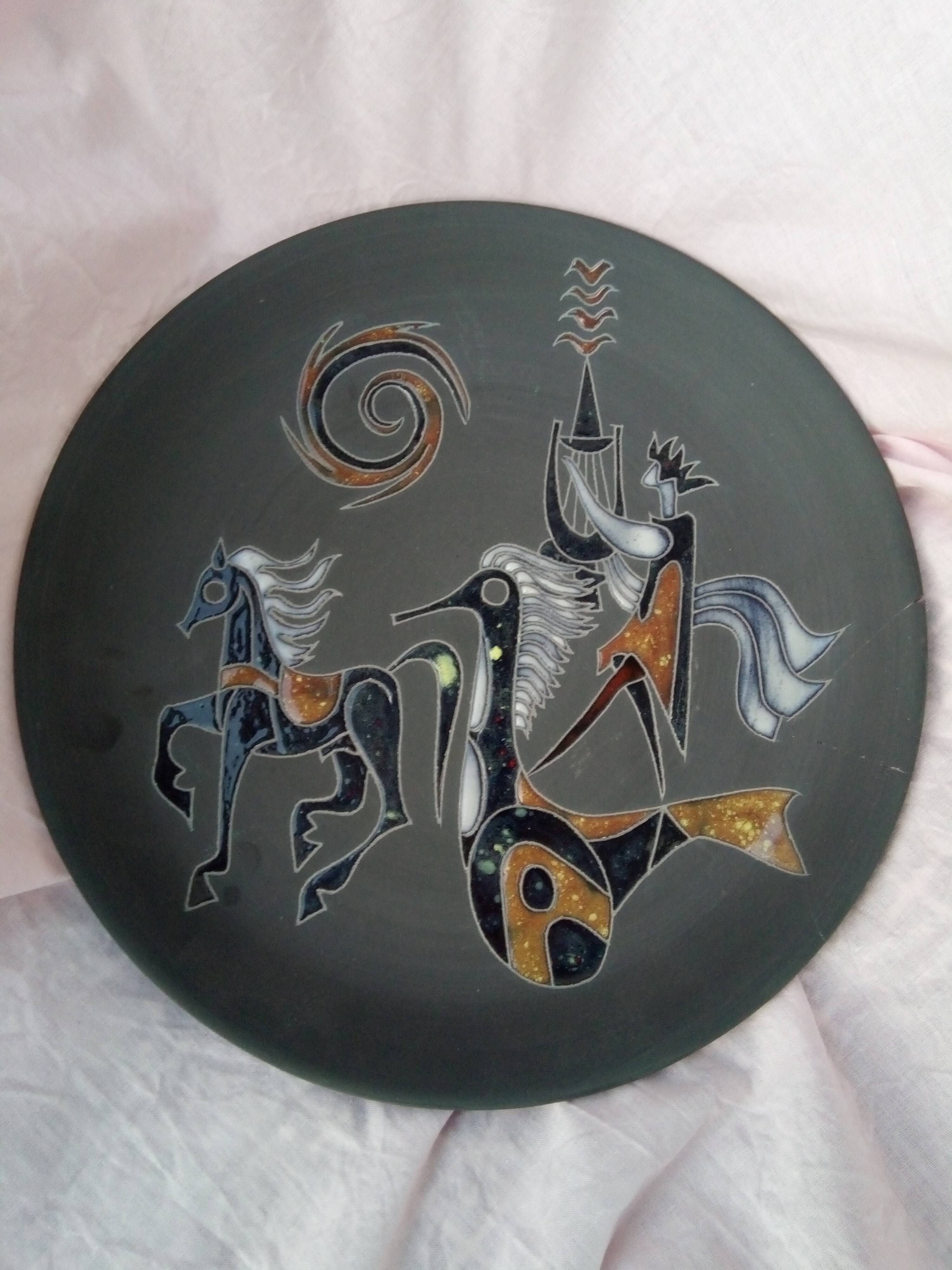 Rare pair of ceramic plates and enamel with mythological decoration. The 50s.