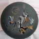 Rare pair of ceramic plates and enamel with mythological decoration. The 50s.