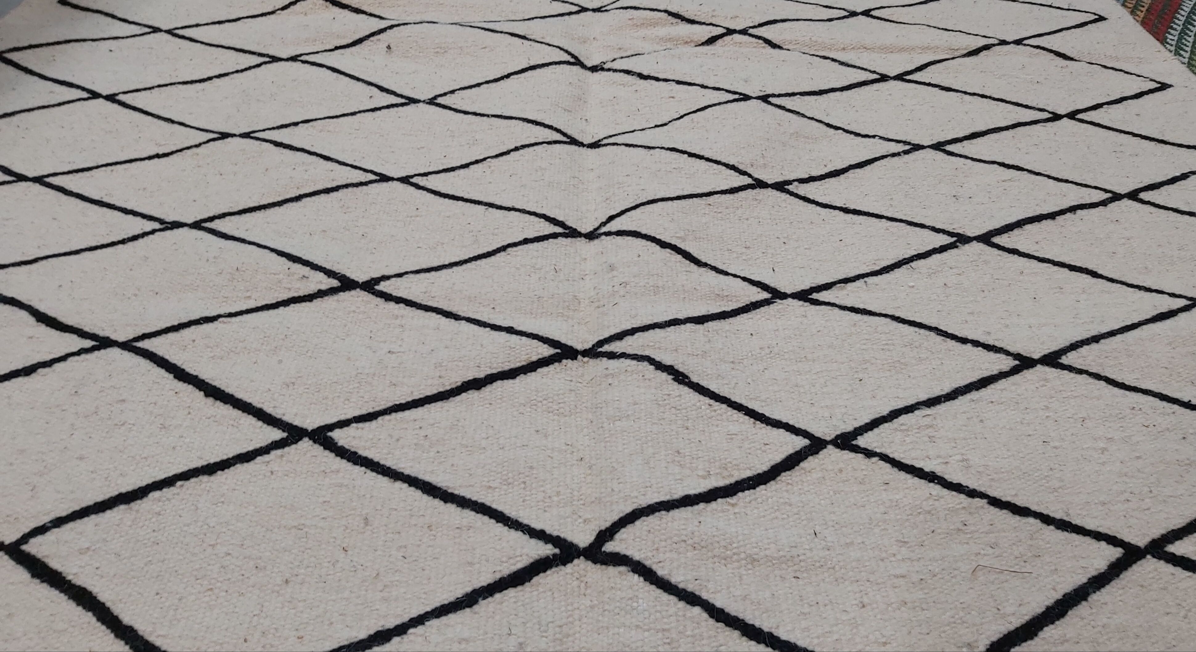 Handmade white and black Berber carpet 245x156cm