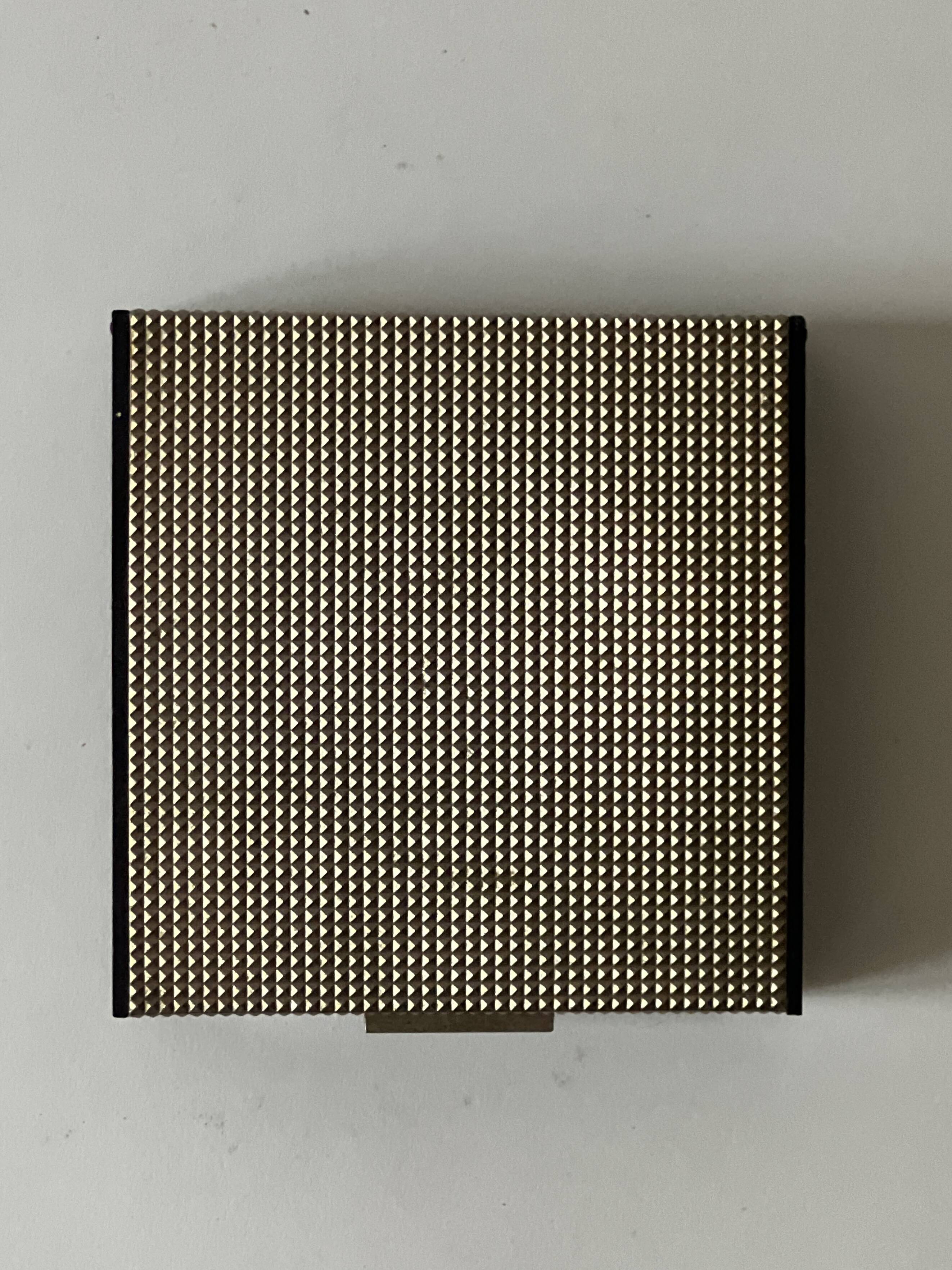 Bakelite and brass pocket emptier, 1970s design